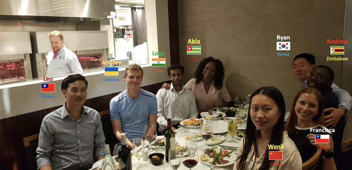 The dinner table with 8 people from 8 different countries.