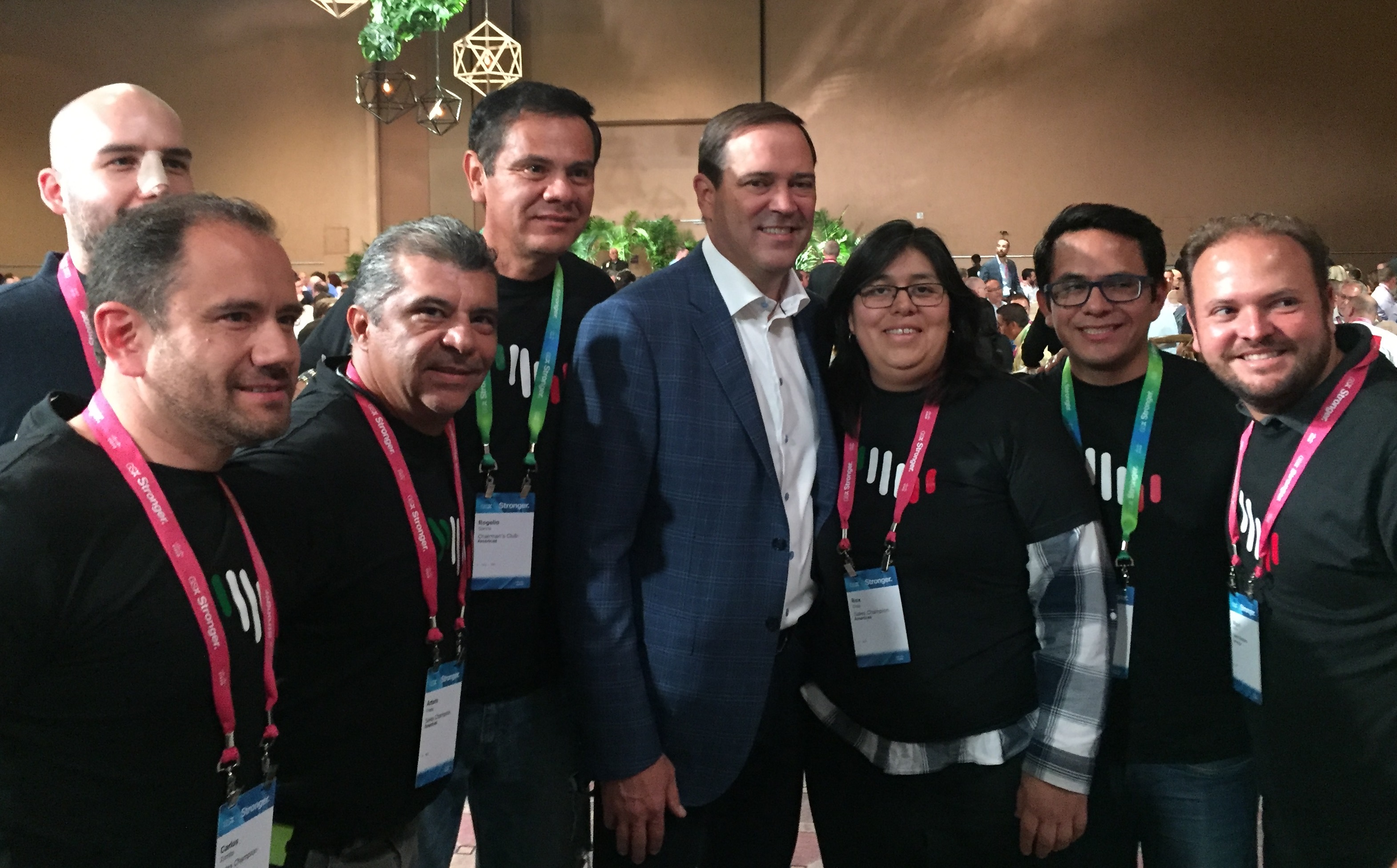 Roxana and her peers with current Cisco CEO Chuck Robbins.