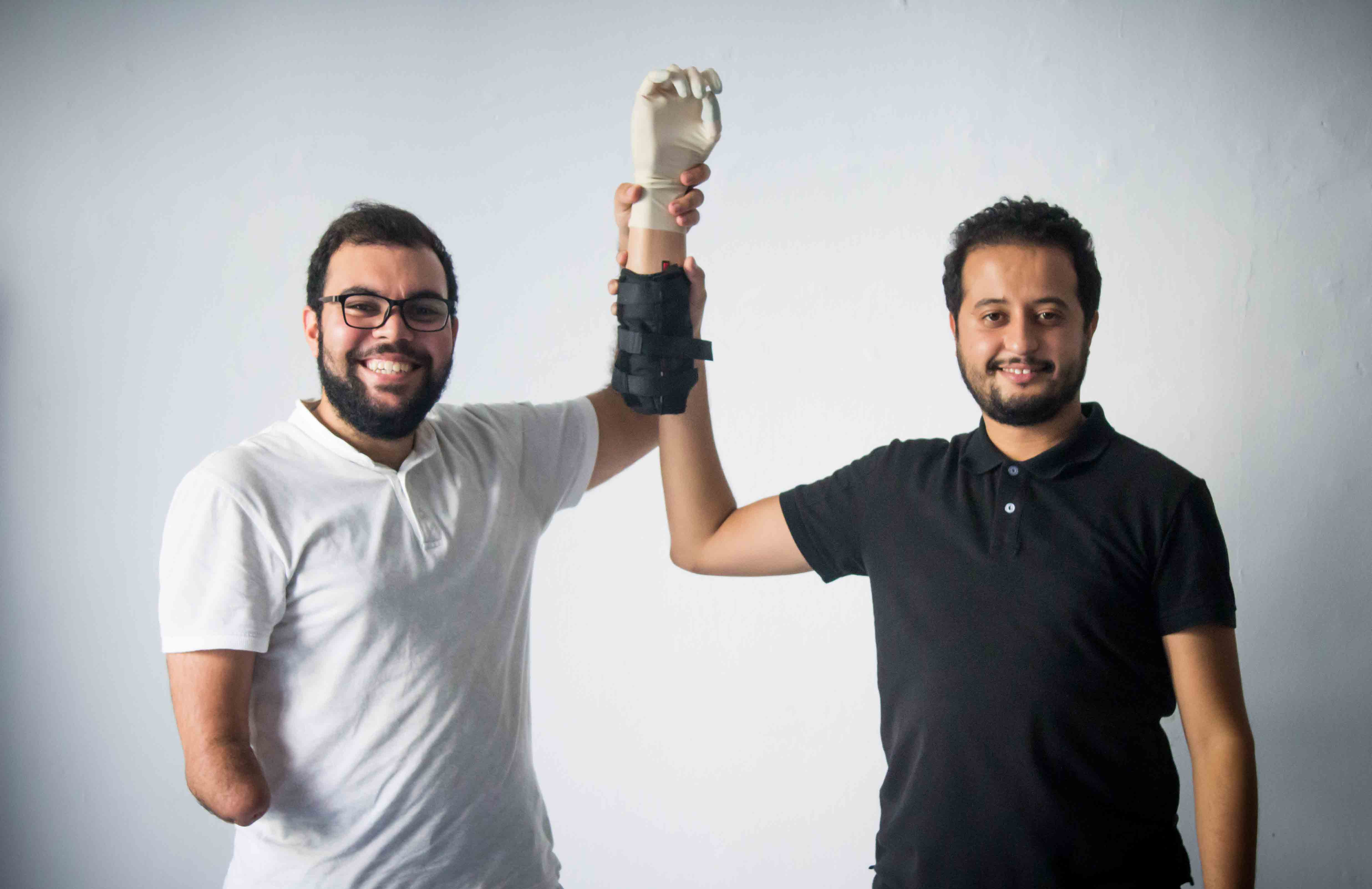 Client with the founder of CURE, Mohamed Dhaouafi