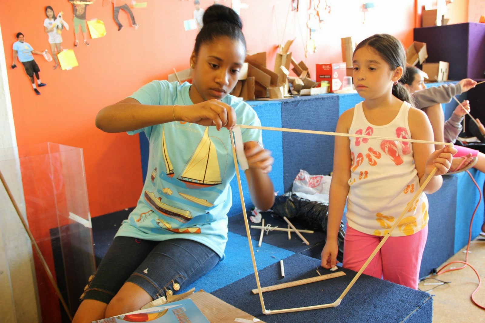 A family working together on a Technovation project