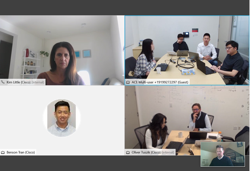 A screenshot from Webex with 4 quadrants of participants and Peter's boss in the lower right hand corner.