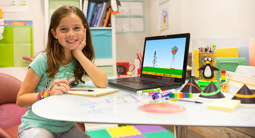 A student using ST Math on a laptop