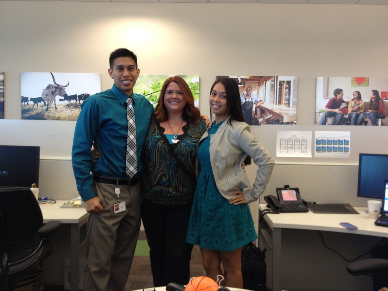 Justin and colleagues pose for a photo.