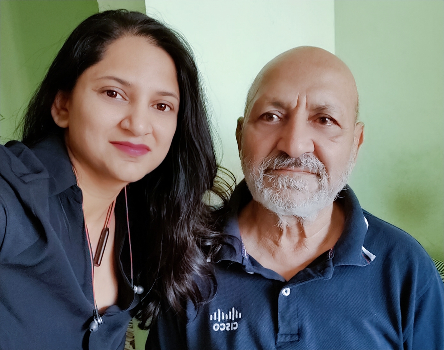Bansari with father in Cisco shirts.