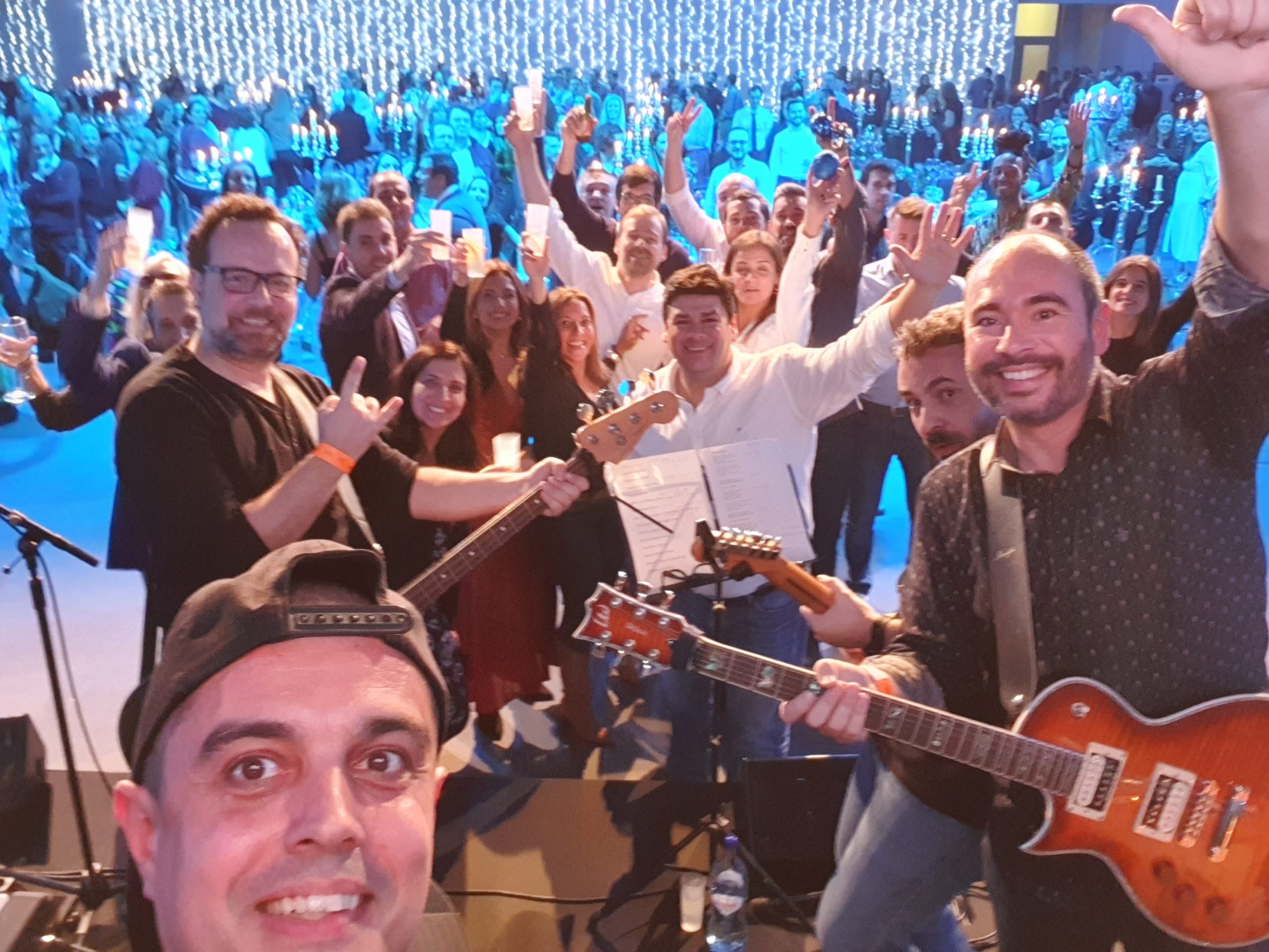 "The Rock 4" taking a selfie with crowd.