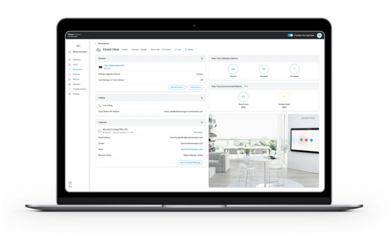 white chair and tables and white couch and DX on wall in computer frame of Control Hub
