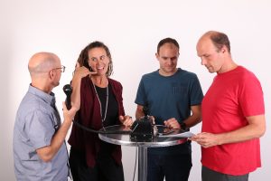 People collaborating to solve a problem