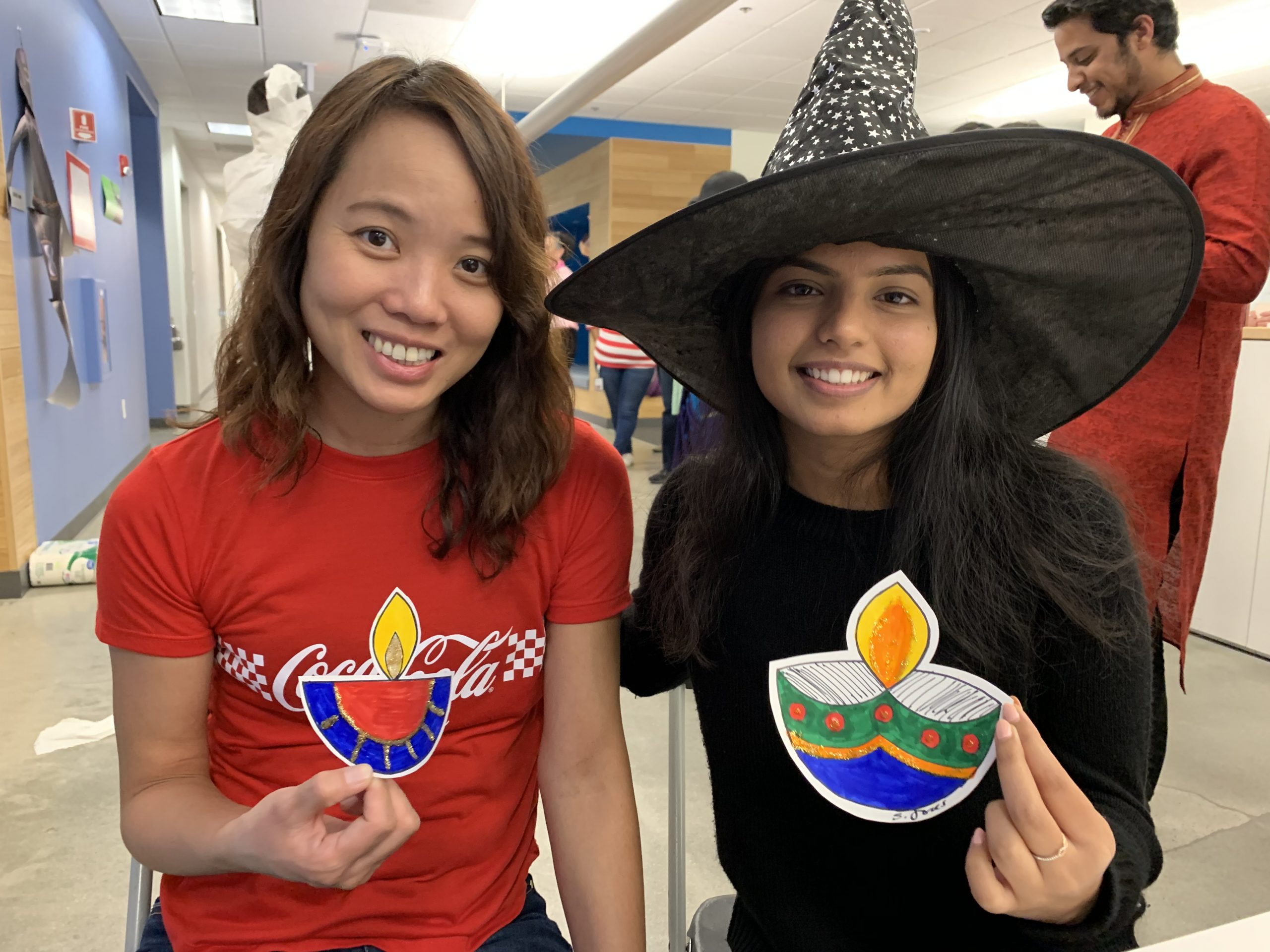 Aishwarya and co-worker celebrating Diwaliween.