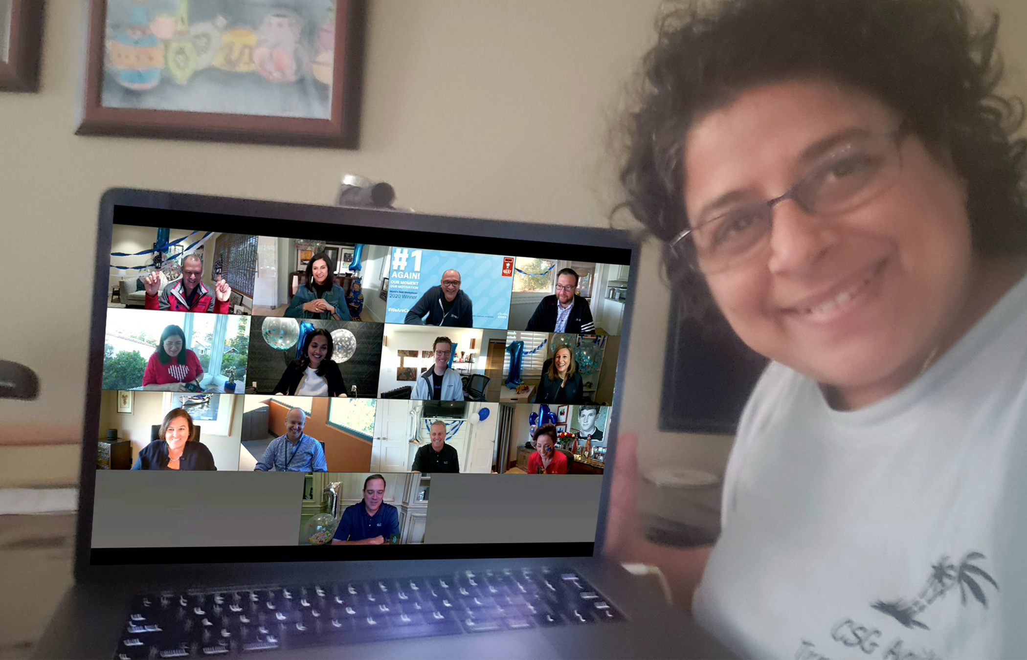 Rashmi sitting at desk working 