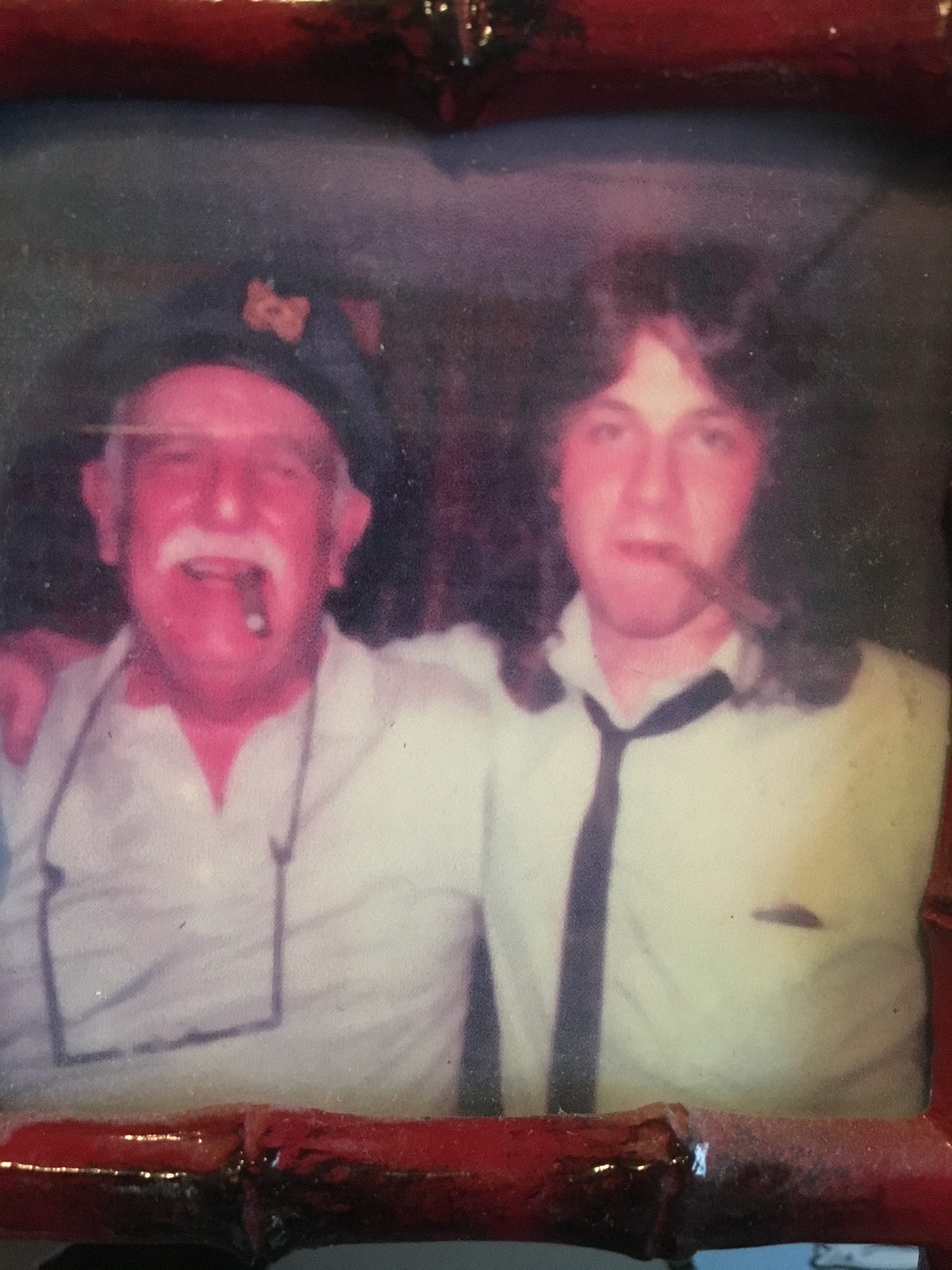 Old photo in frame of Ken and his father 