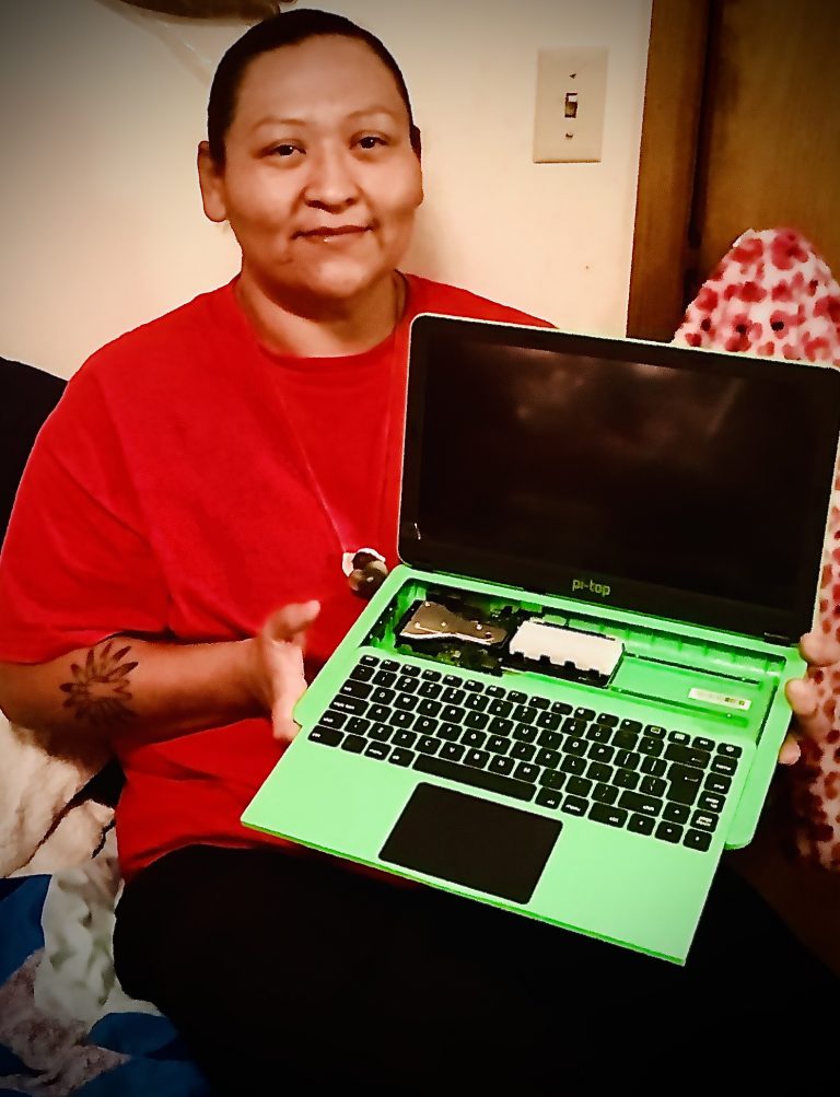 Tribal College student with a laptop