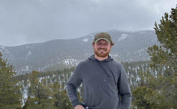 Ryan with mountains behind him.