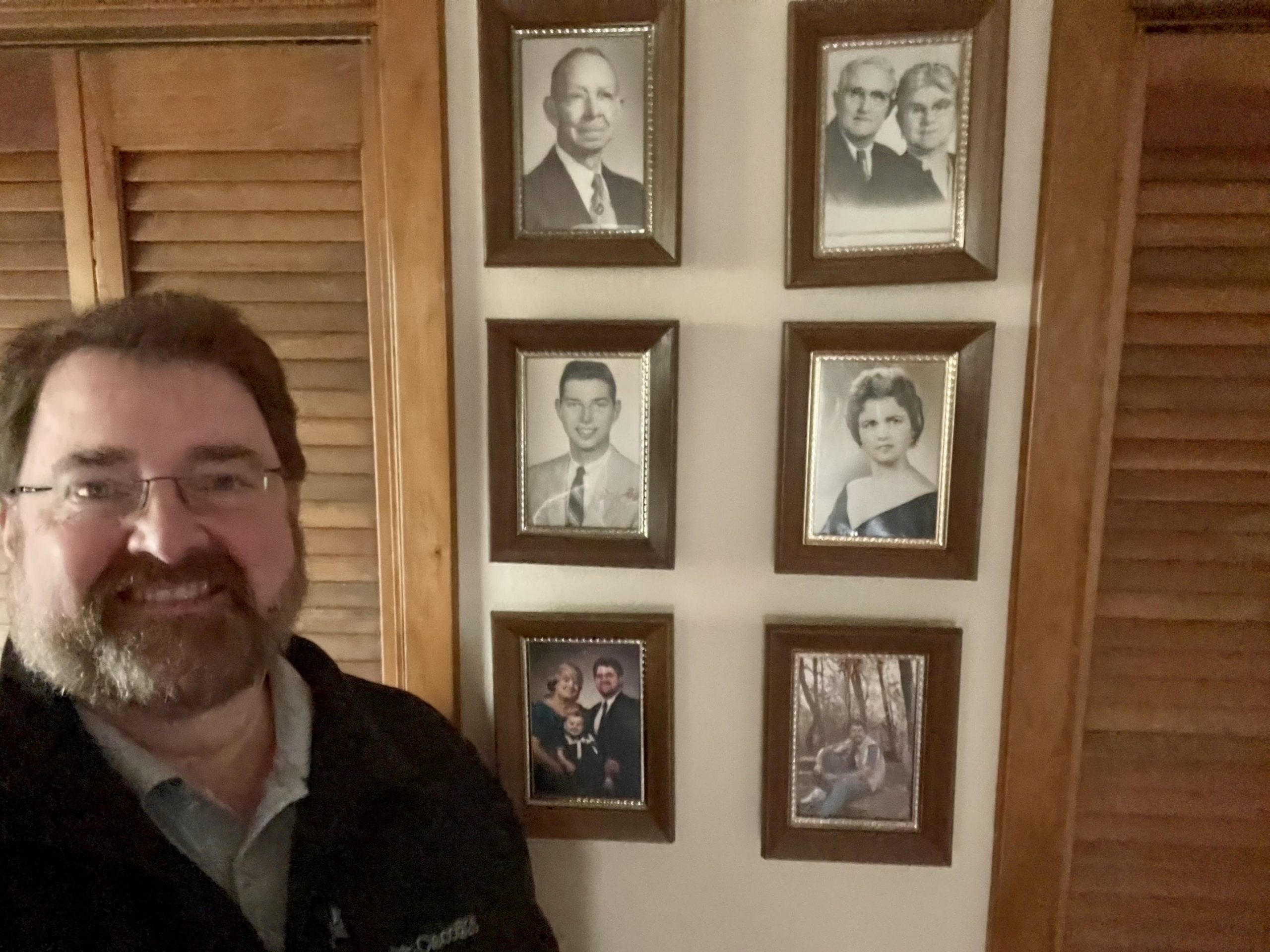 Keither taking a selfie in his home