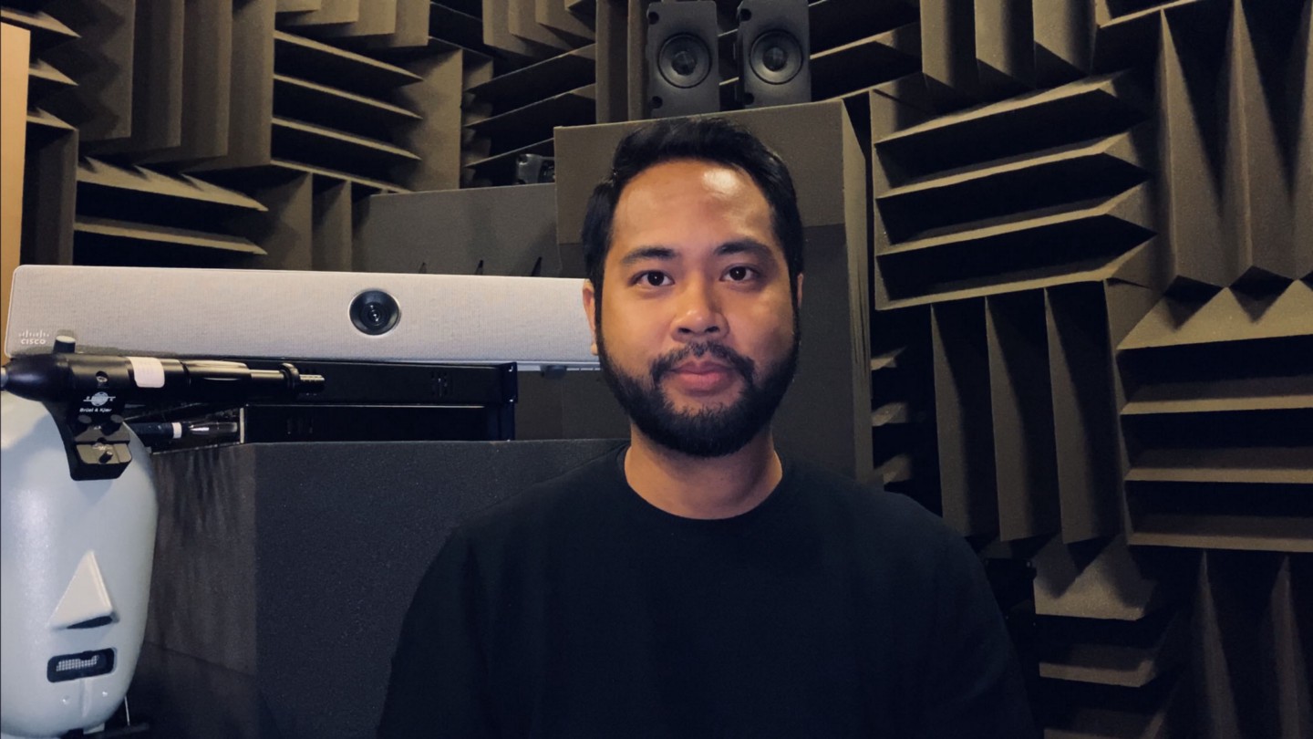 Josh in a studio recording room.