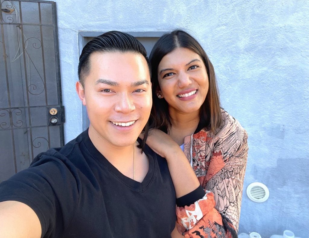 Brian and friend pose for a photo.