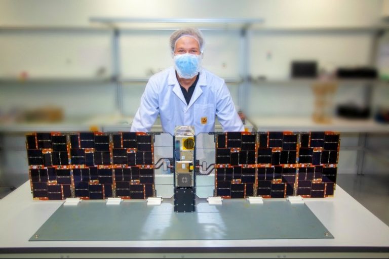 One of our nanosatellites with Fleet Space Engineer Kody Cook