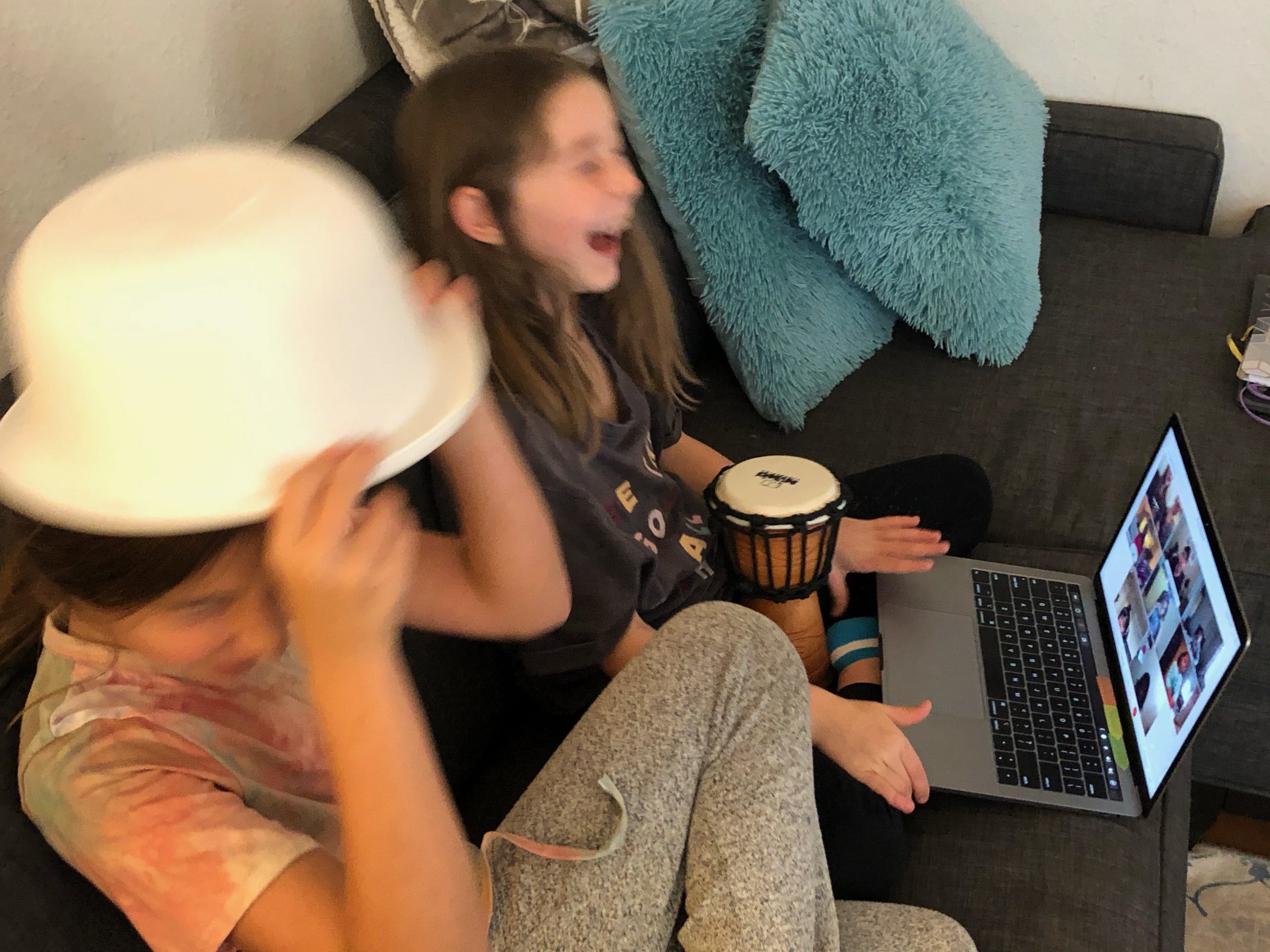 Kids enjoying remote online music class