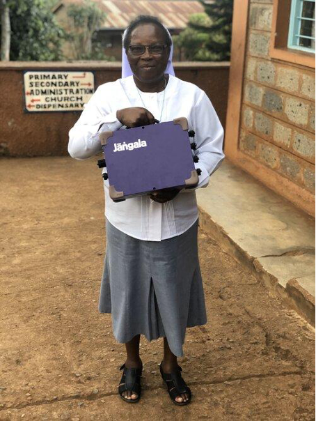 Woman holding up the Big Box