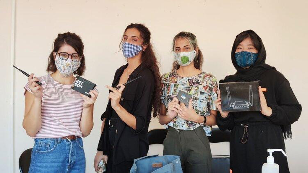 Four women standing together