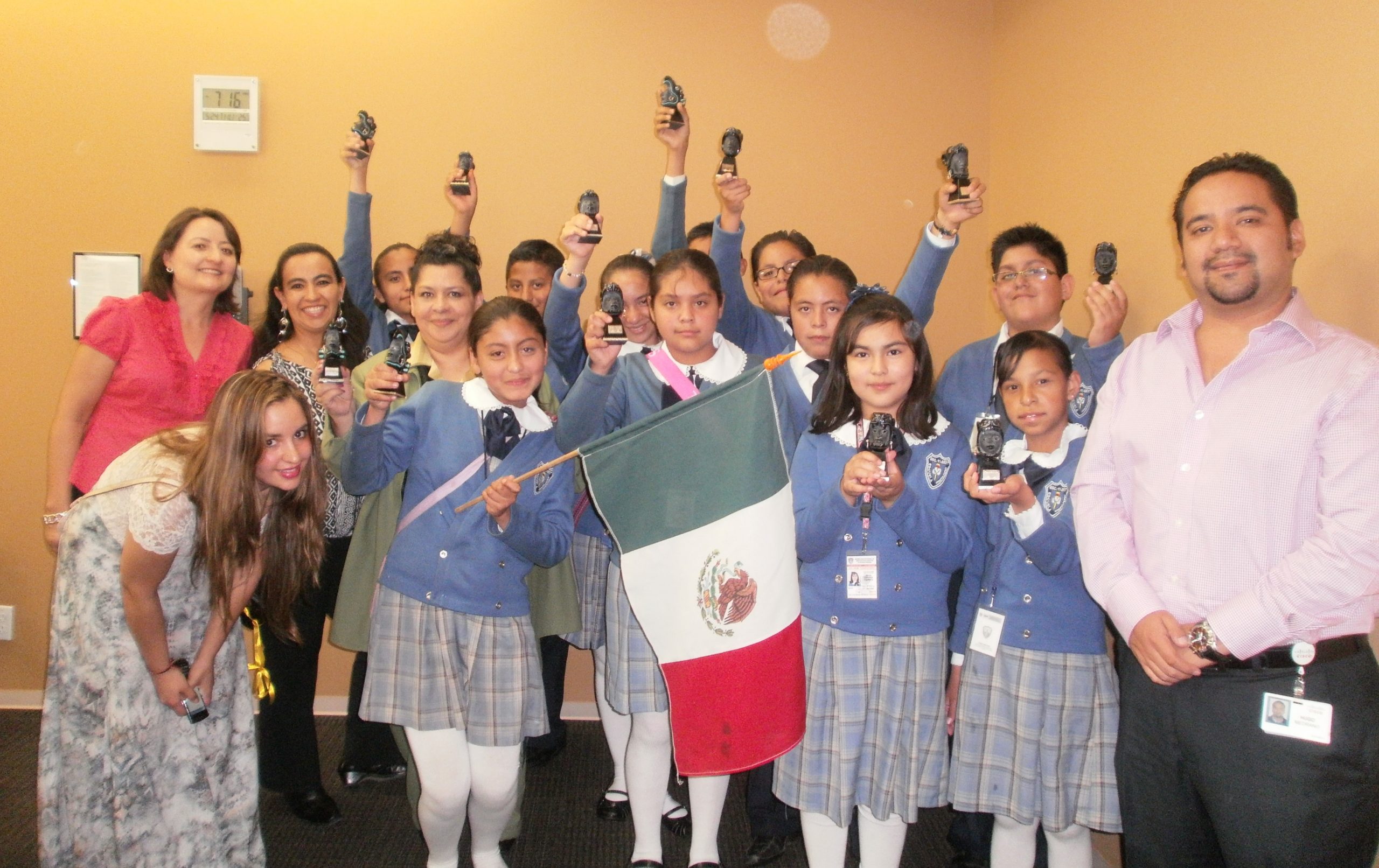 Luisa with kids at a giveback event.