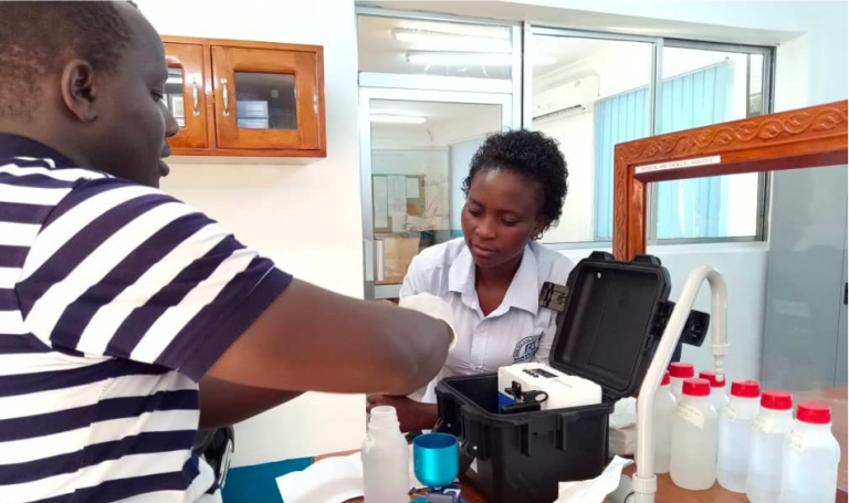 Two people working in a lab setting