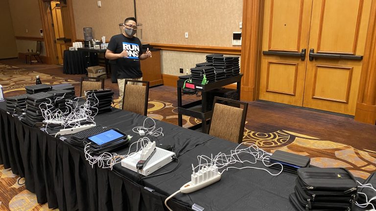 Stacks of 340 iPads being charged for BH registration team.