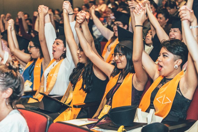 Women celebrating their graduation