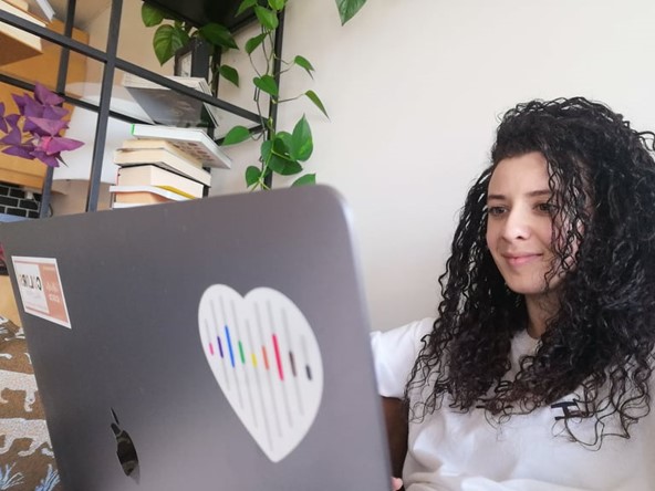 Miriam working at computer.