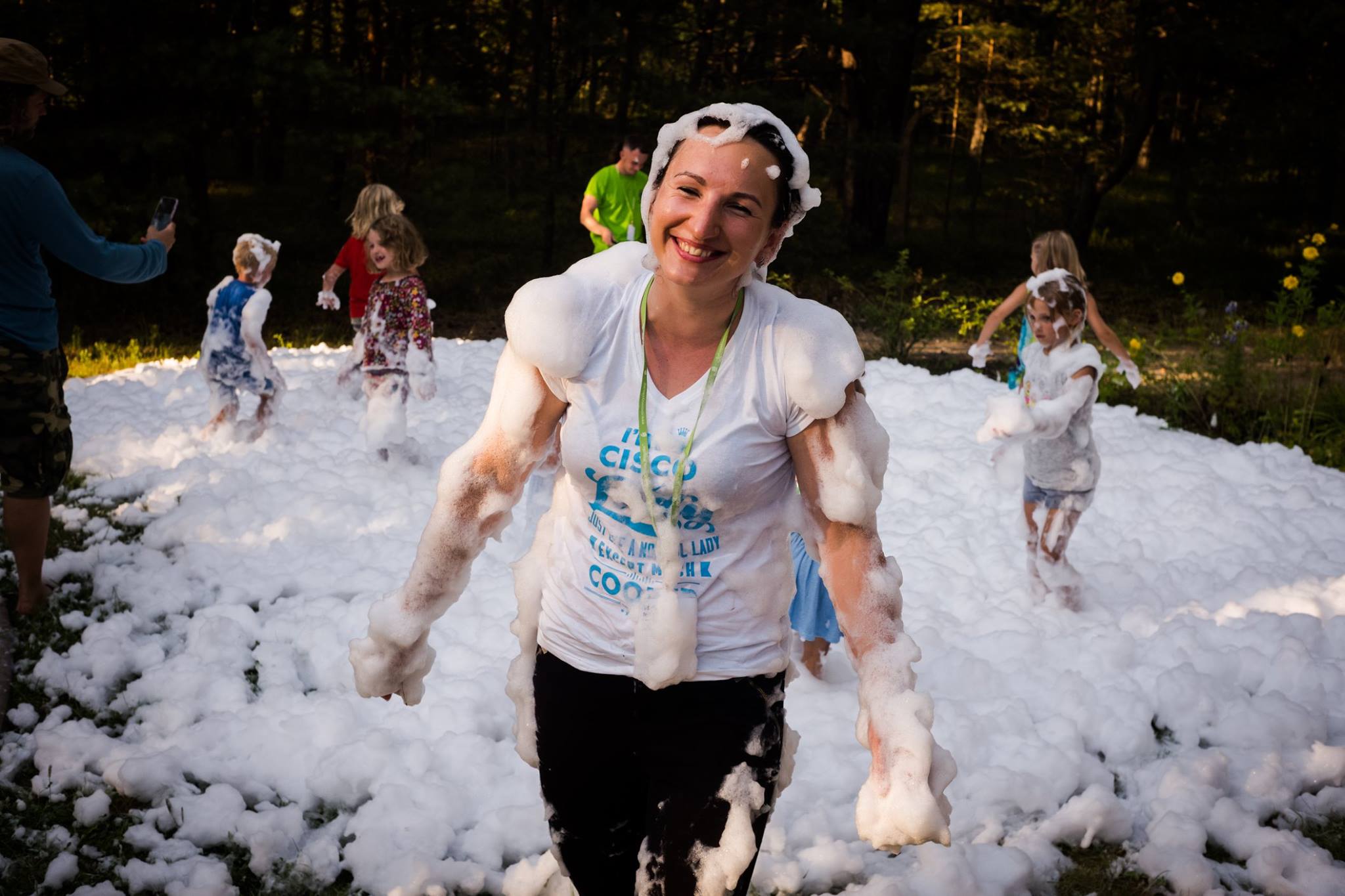 Tatiana covered in bubbles.