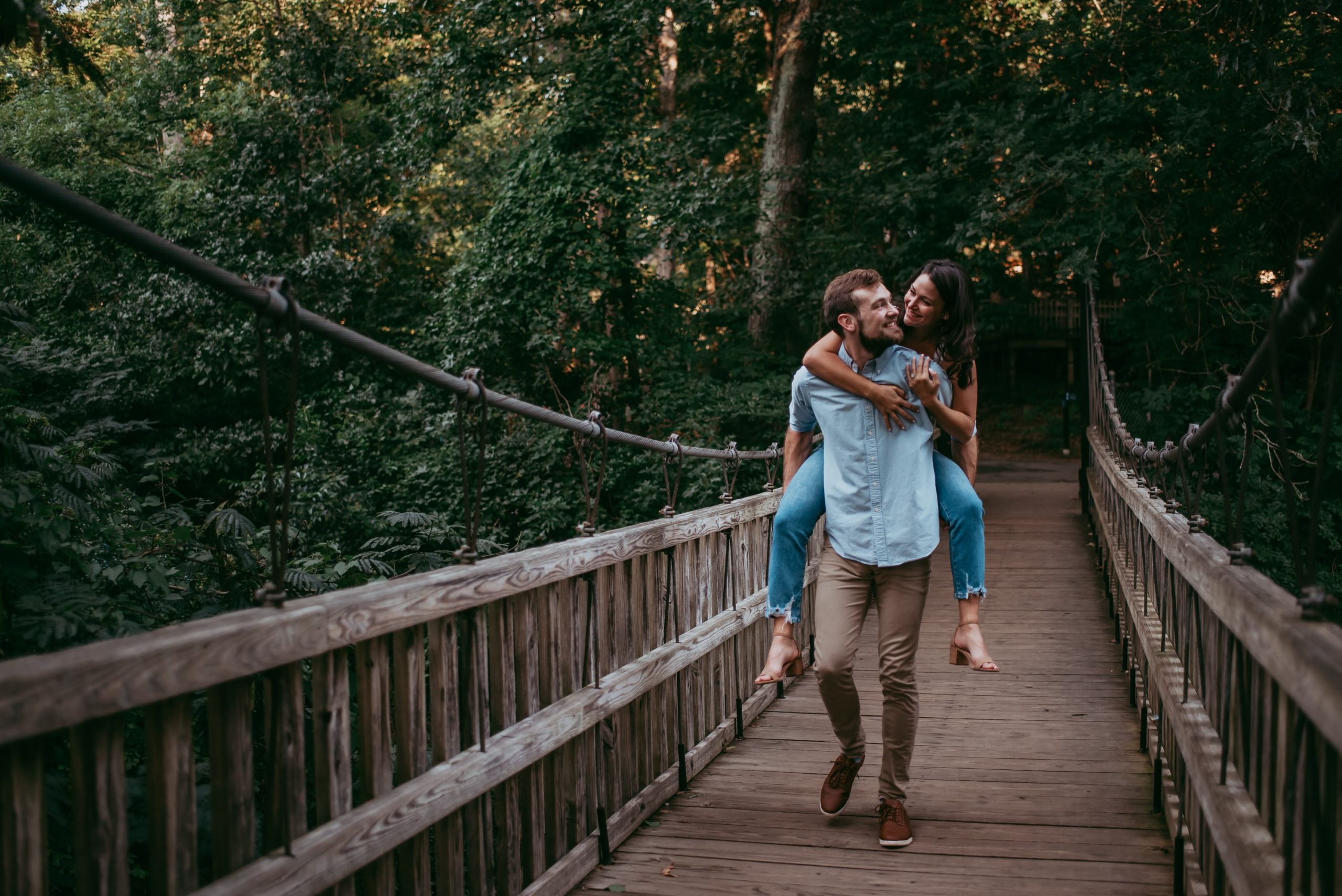 Anna and Paul walking across a bridge/