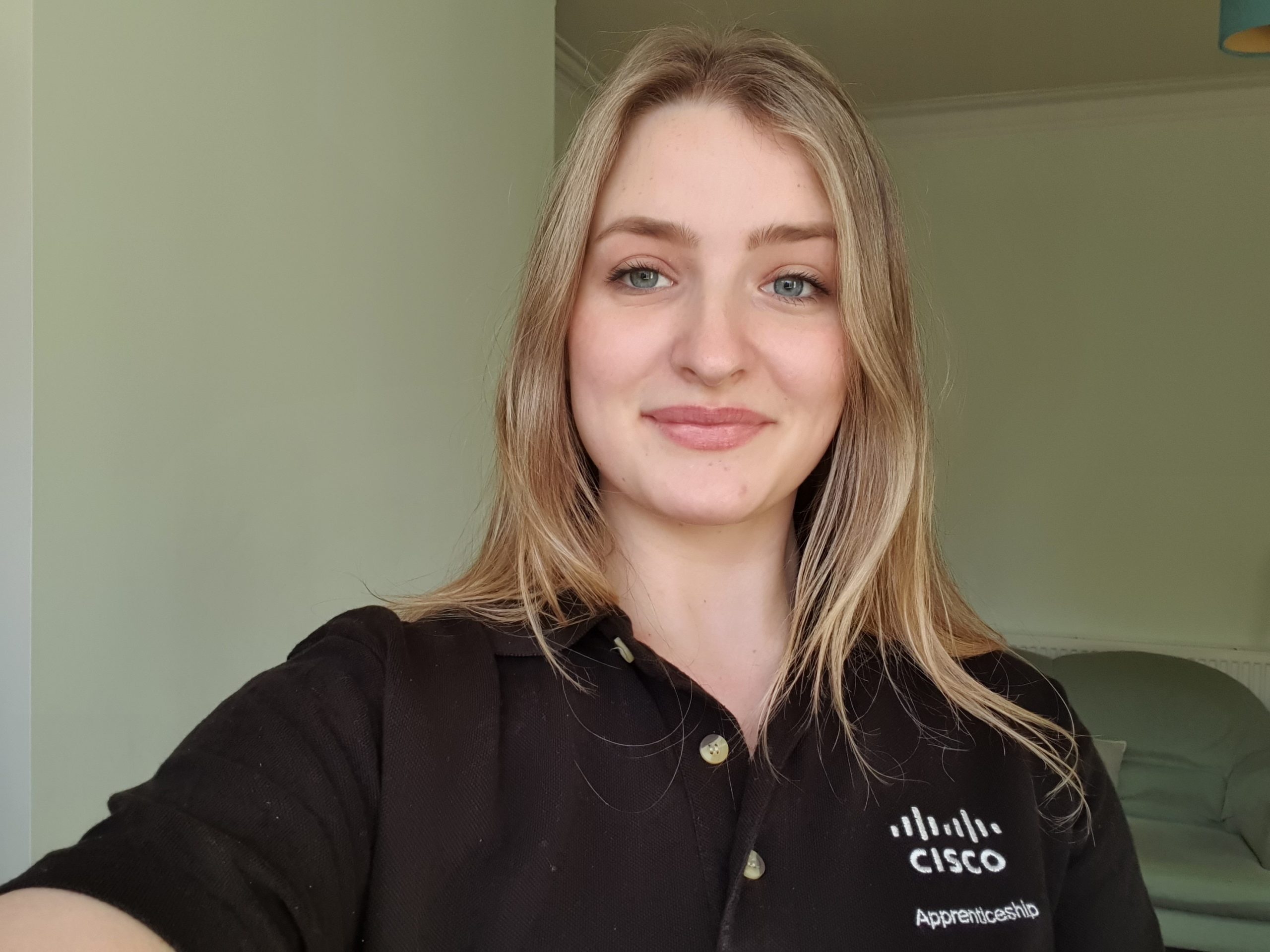 A selfie of Ciara in her Cisco Apprenticeship polo.