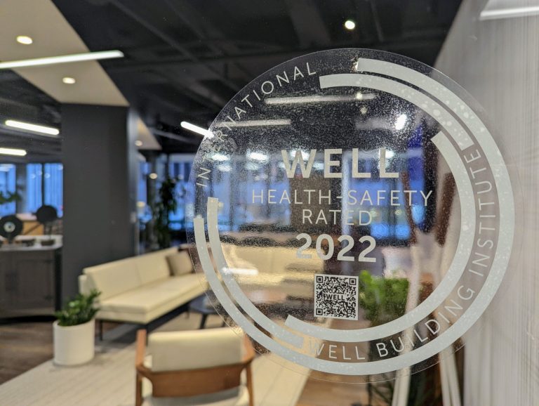 Etched glass that shows WELL Building Standard certification