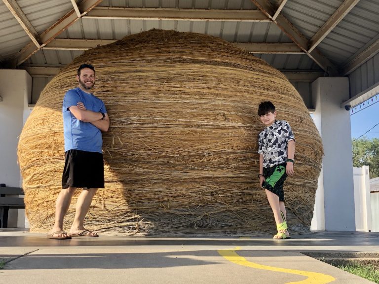 Hank and his son visit the largest ball of twine