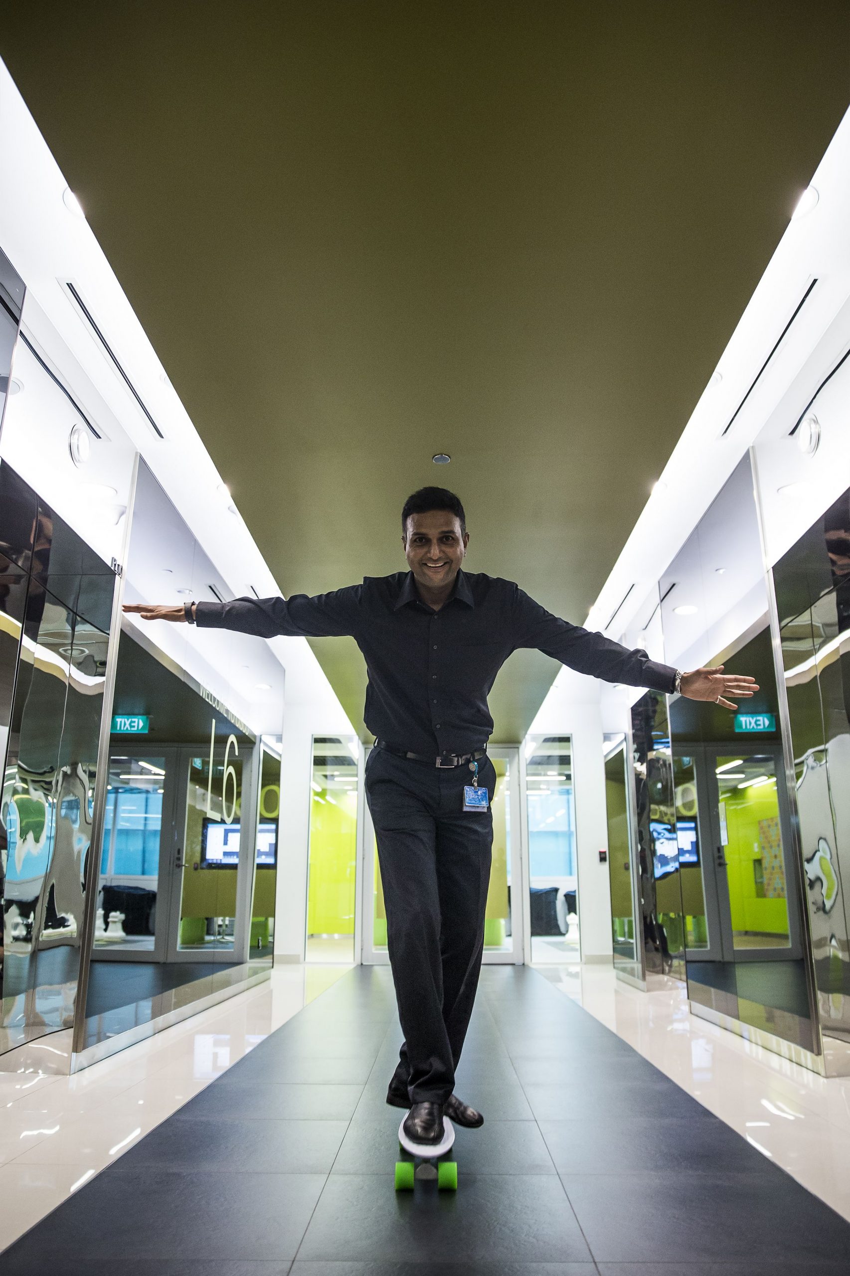 Man skateboarding down hall