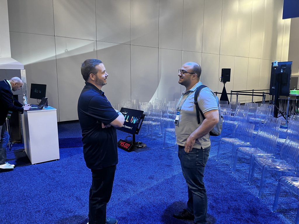 Attendee approaches Hank Preston after a session at Cisco Live 2022.