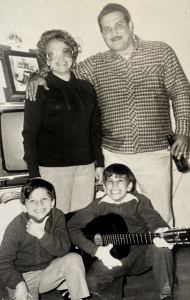 Young Alvio Barrios with guitar