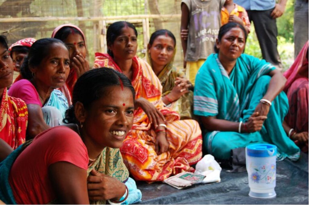 Women participating in Trickle Up meet as a group