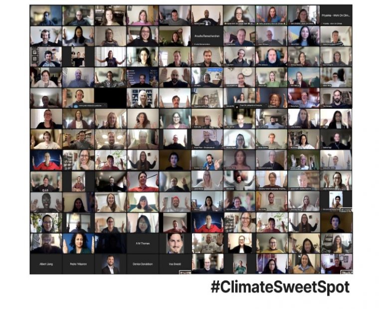 A screenshot of a big group of people meeting virtually.