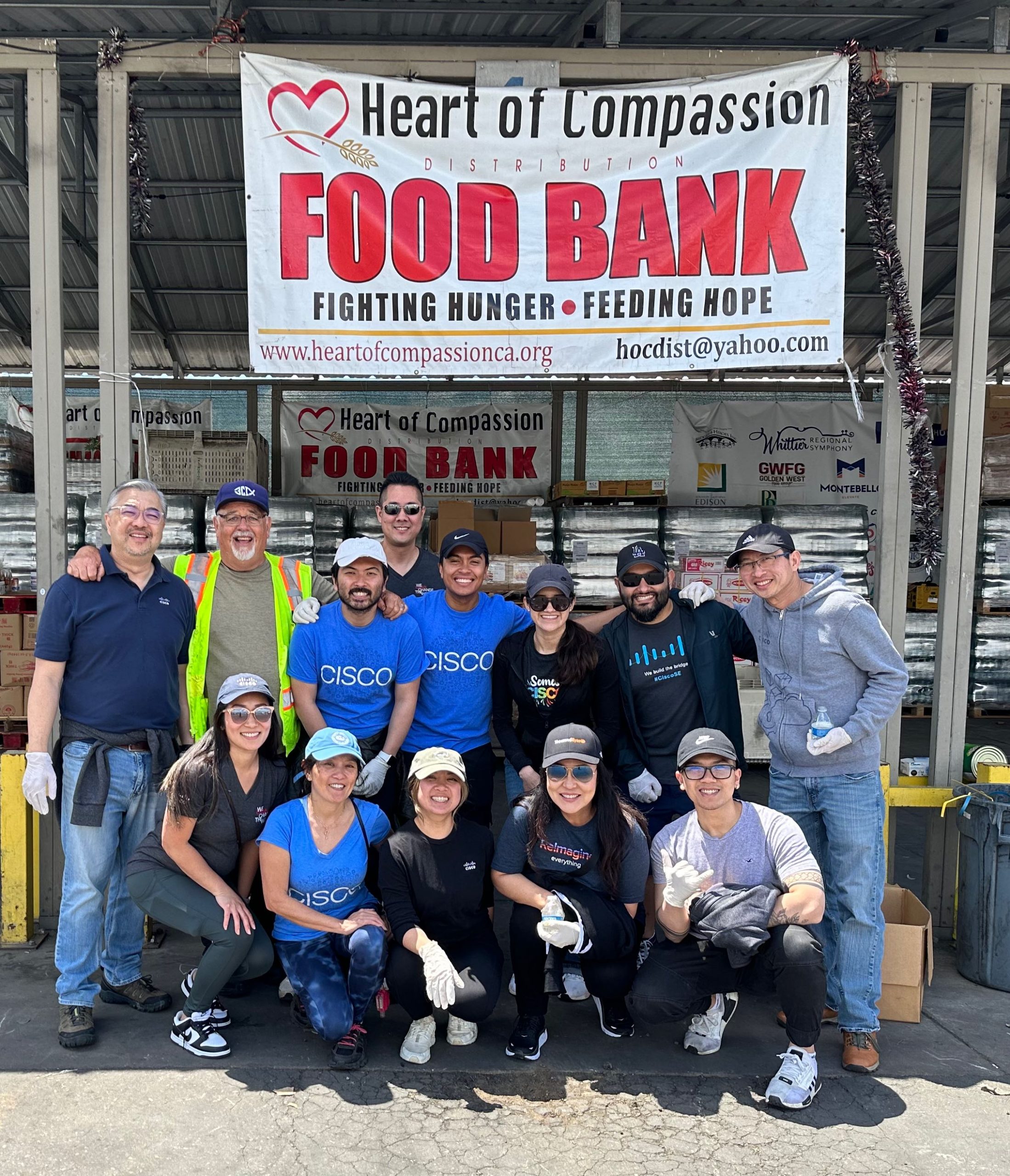 Robert and other CAAN members volunteering at a food bank. 