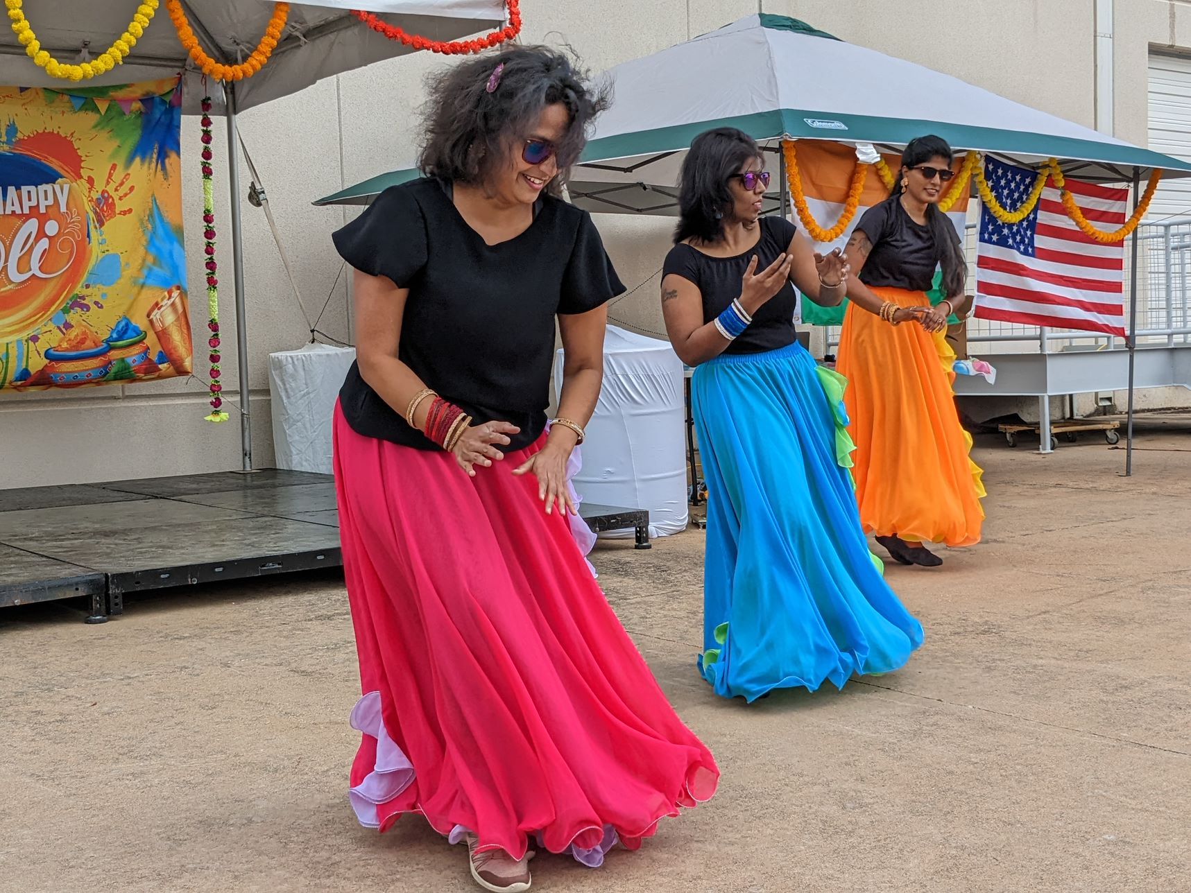 Employees dancing at a Cisco Austin Holi Event.