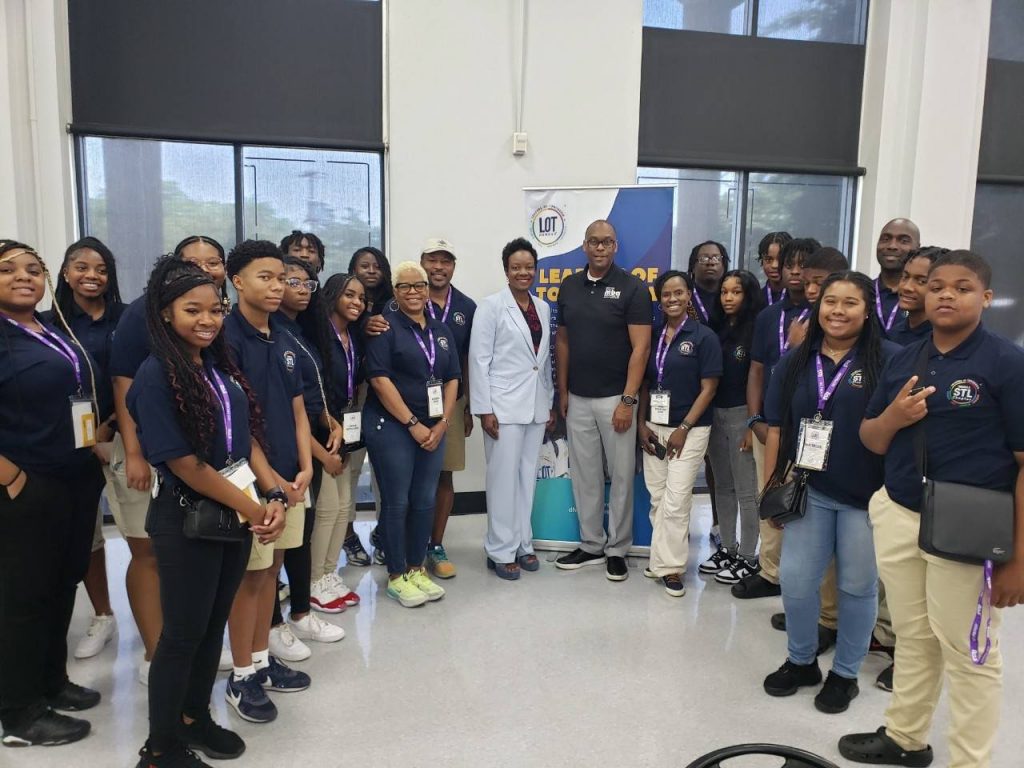 Image of Andrico and the students he helped 