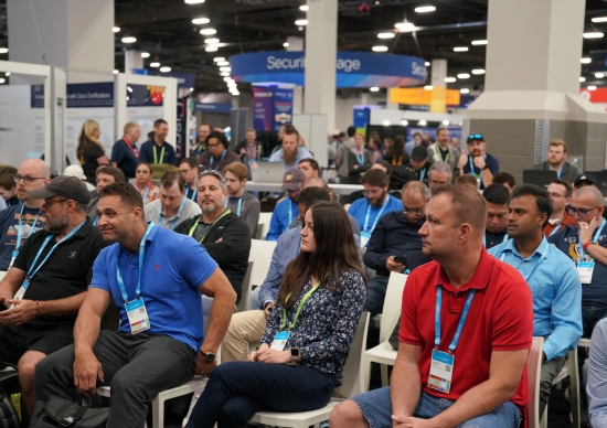 An engaged crowd at the Cisco U. Theater.