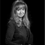 photo of Ilham Rahali, a woman with long medium colored hair