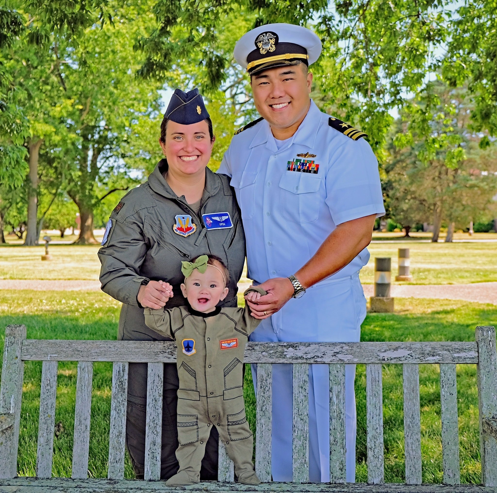 Jonathan and his family dressed in military attire.