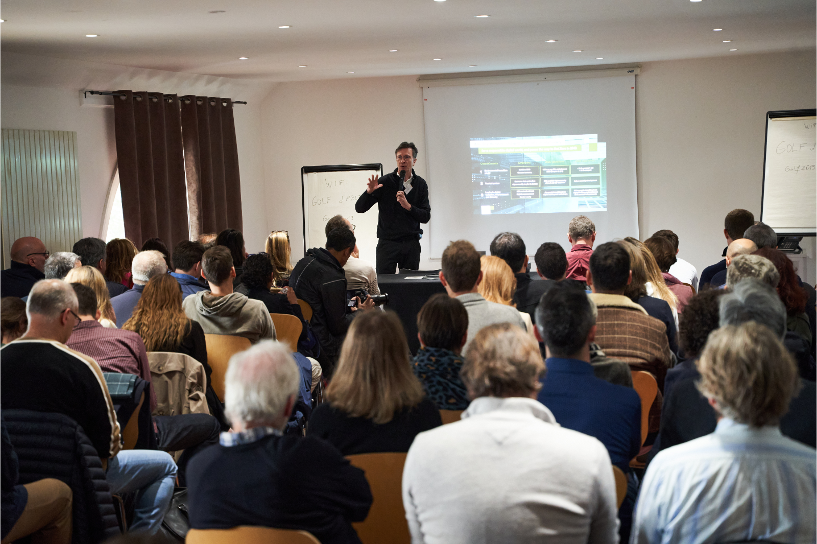 Cisco, ThousandEyes, and Orange Business employees attend the Green Day conference