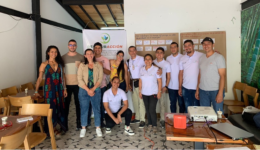 A group of young people gathered together in a room