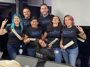 Group of people huddled together.