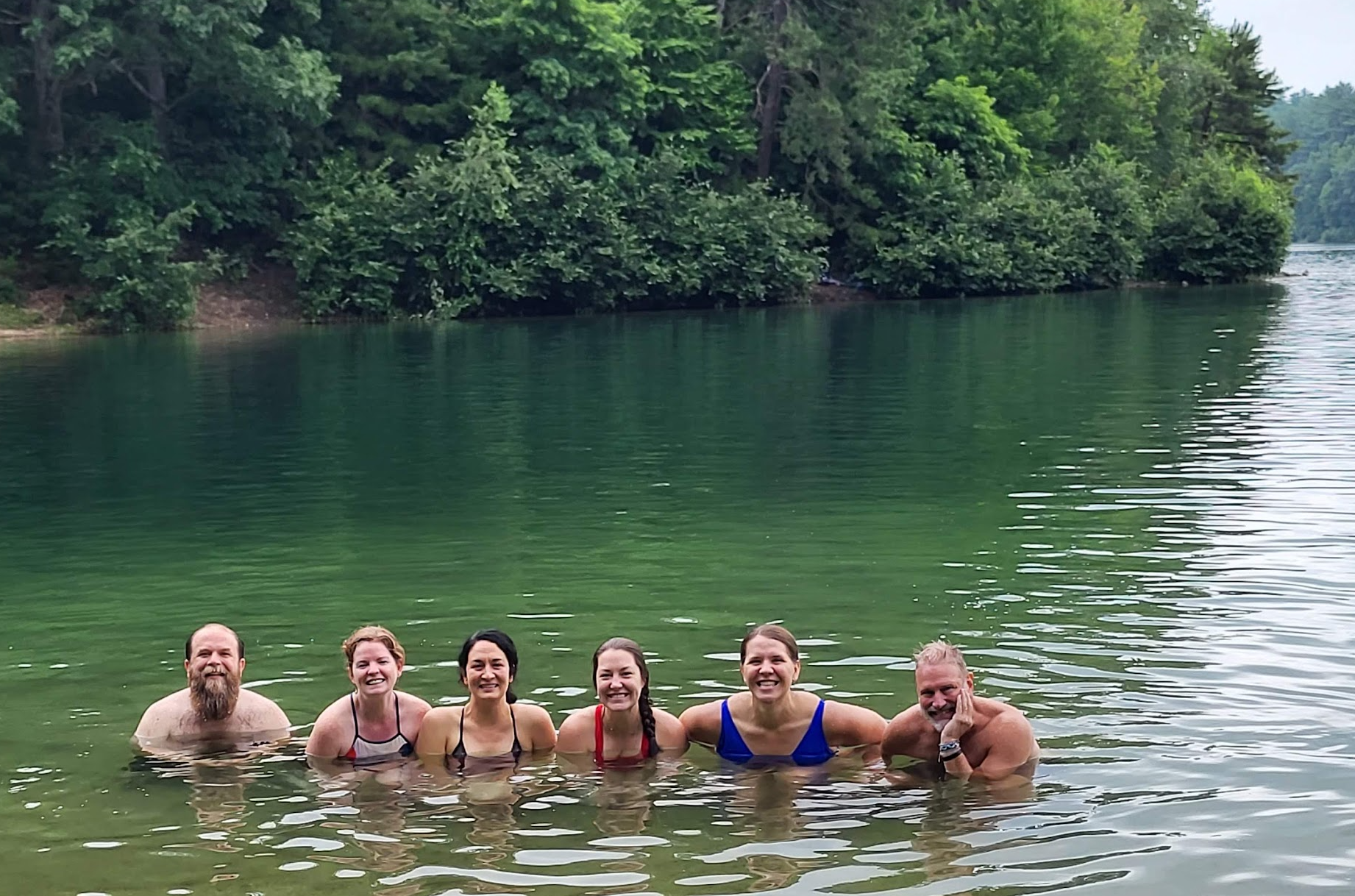 Six people in a lake.
