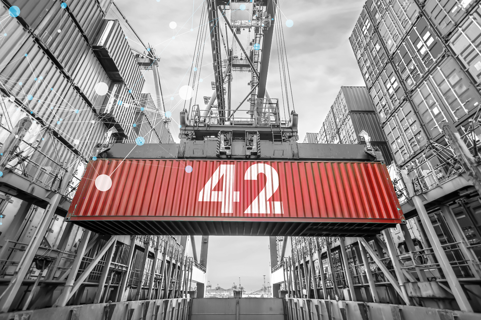 Container 42 lifted by machine in cargo bay