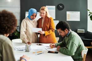 Workers collaborating together at a table
